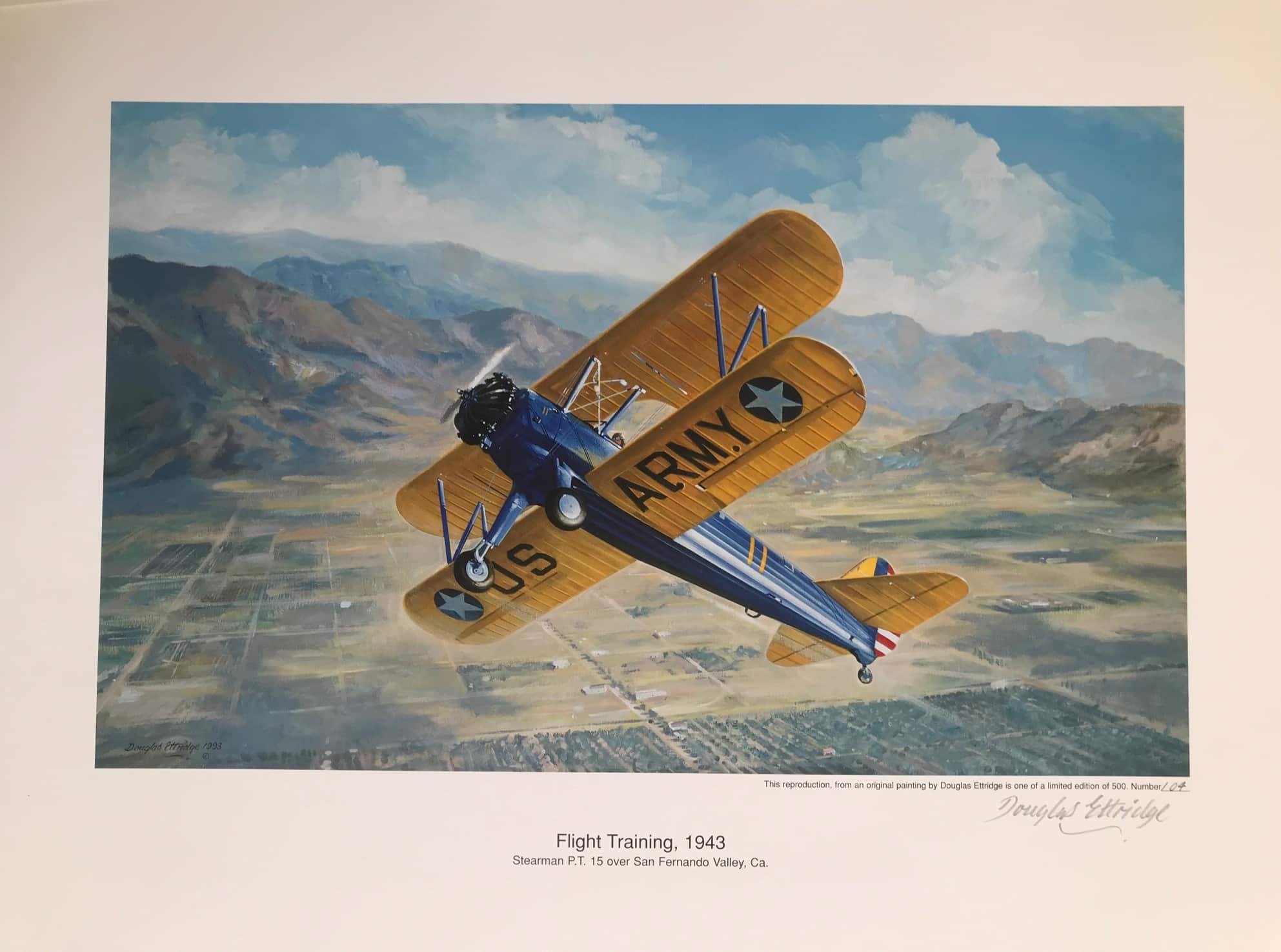 Flight training 1943. Stearman P.T.15 over San Fernando Valley Ca. Original art print by Douglas Ettridge 1927-2009. Signed and numbered 104/500